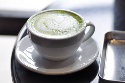 High angle view of coffee on table