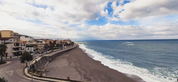 Panoramic view of beach against sky