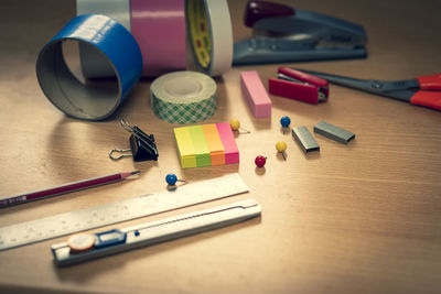 High angle view of office supplies on table