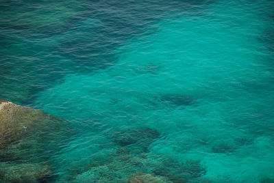 Scenic view of sea against blue sky