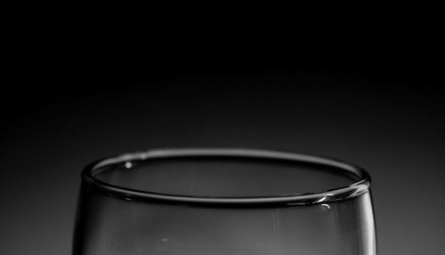 Close-up of drink over black background