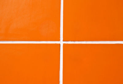 Full frame shot of orange white background