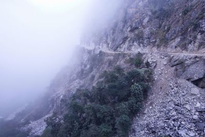 Scenic view of mountains during foggy weather