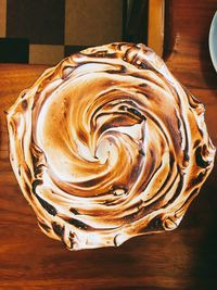 Close-up of cappuccino on table