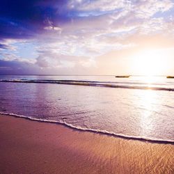 Scenic view of sea against sky at sunset