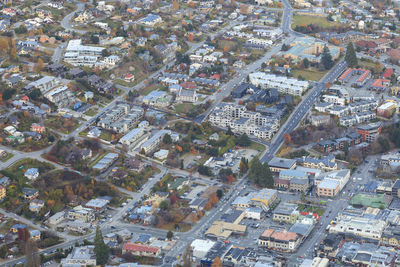 High angle view of illuminated buildings in town