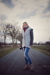 Woman walking on road