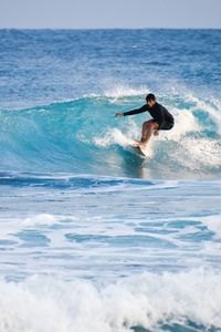 Man surfing in sea