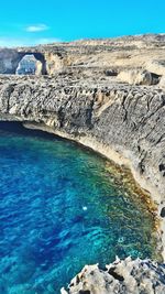 High angle view of rocky coastline