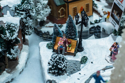 High angle view of cross on snow in building, christmas property