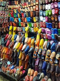 Full frame shot of various shoes for sale