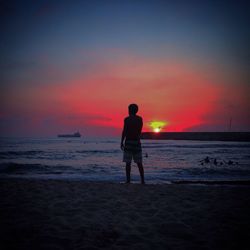 Scenic view of sea at sunset