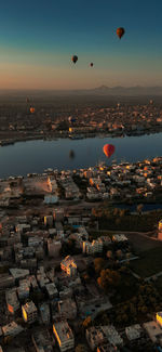 High angle view of city at sunset