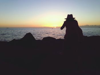 Scenic view of sea at sunset