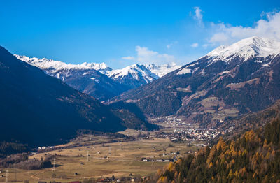 Scenic view of snowcapped mountains against sky