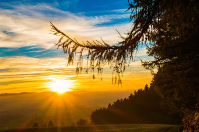 Scenic view of sunset over landscape