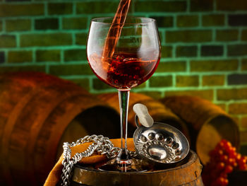 Close-up of wineglass on table