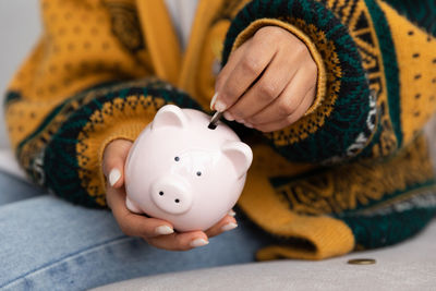 Close-up of piggy bank on table