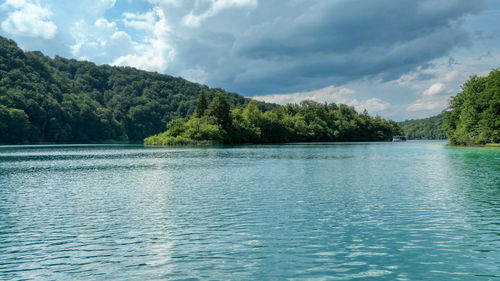 Scenic view of kozjak lake against sky