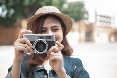 Portrait of man photographing