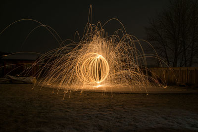 Firework display at night