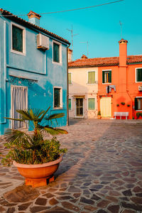 Burano square with characteristic houses colorful houses