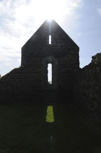 Low angle view of historical building against sky