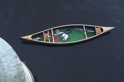 High angle view of boat floating on water