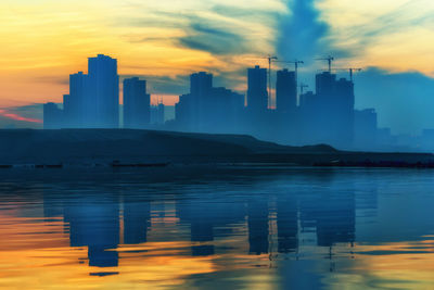 Panoramic view of sea against sky during sunset