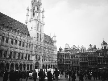 Tourists in front of historic building