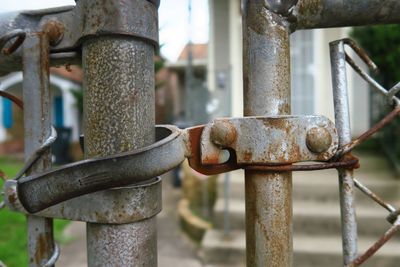 Close-up of rusty gate latch