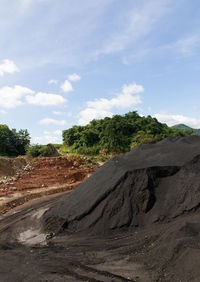 Scenic view of volcanic landscape against sky