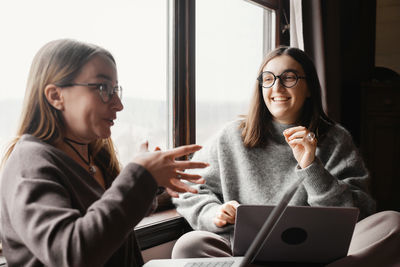Young woman using mobile phone