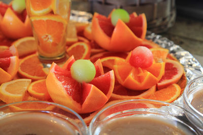 Close-up of chopped fruits in glass