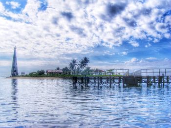 View of river against cloudy sky