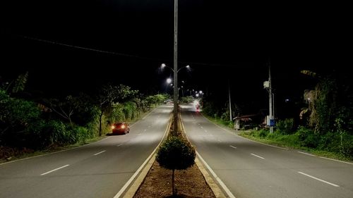 Car on road at night