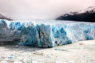 Scenic view of glaciers against sky