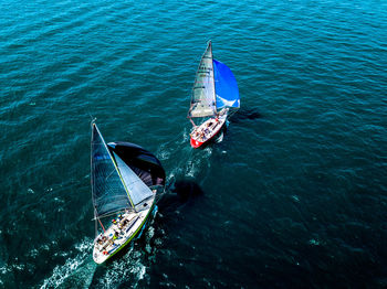 High angle view of sailboat sailing in sea