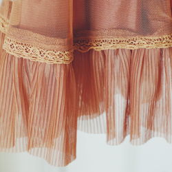 Full frame shot of clothes hanging on table