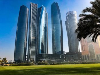 Low angle view of modern buildings against sky