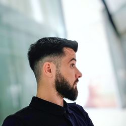 Close-up of young man looking away