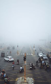 High angle view of people on street in foggy weather