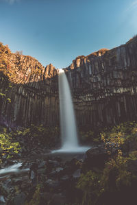 Low angle view of waterfall