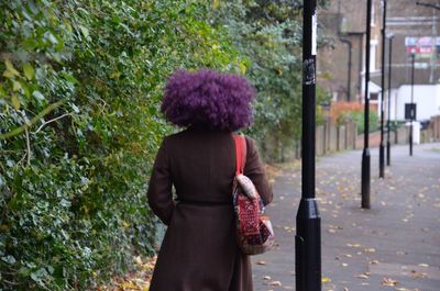 Rear view of a woman walking outdoors