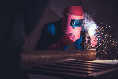 Person working in illuminated room