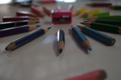 High angle view of colored pencils on table