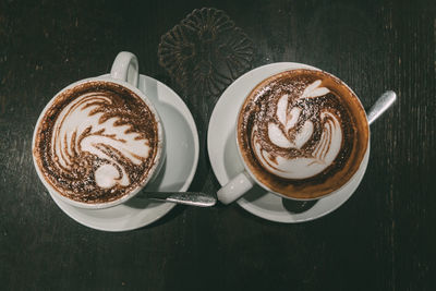 High angle view of cappuccino on table