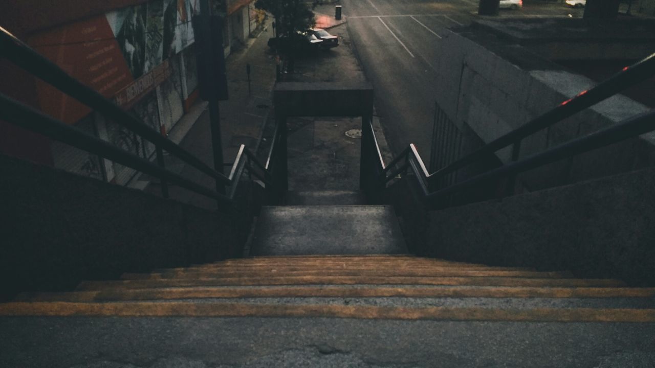 staircase, steps and staircases, architecture, railing, the way forward, built structure, direction, high angle view, indoors, transportation, building, moving up, city, diminishing perspective, no people, day, subway