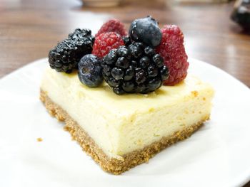 Close-up of cheesecake in plate on table