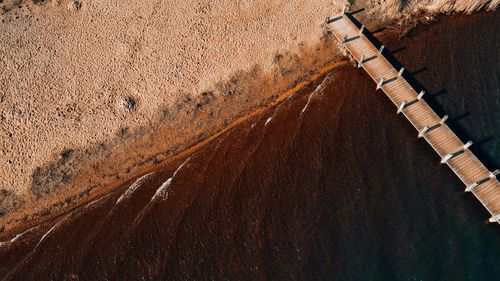 High angle view of shadow on sand